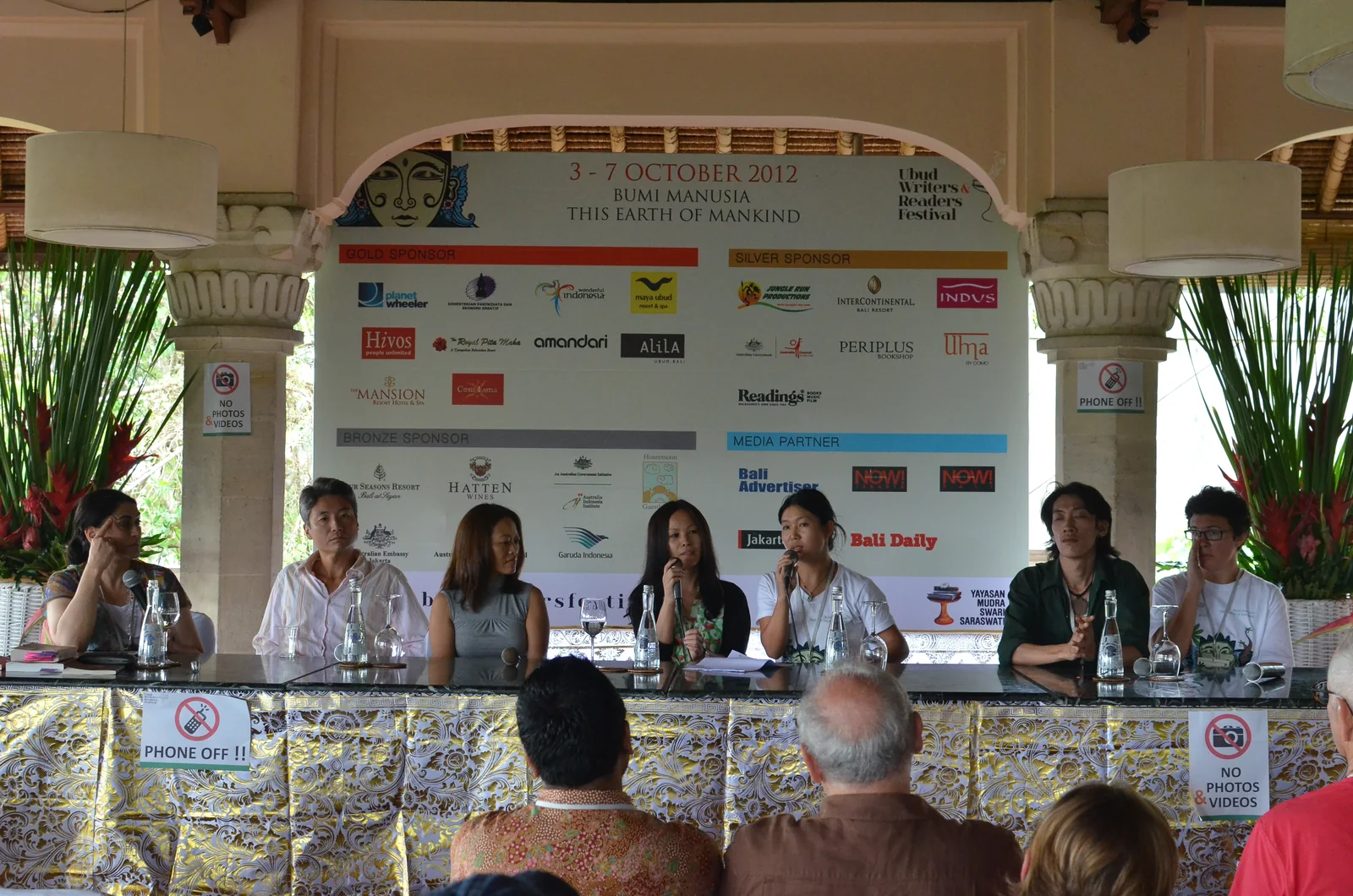 Panellists at a long table and an audience at the An Asian Equation session in Ubud in 2012
